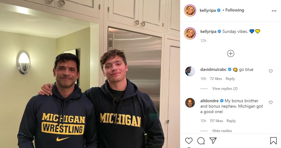 Kelly Ripa Proudly Shares Photo Of Joaquin & Mark In Michigan Jackets