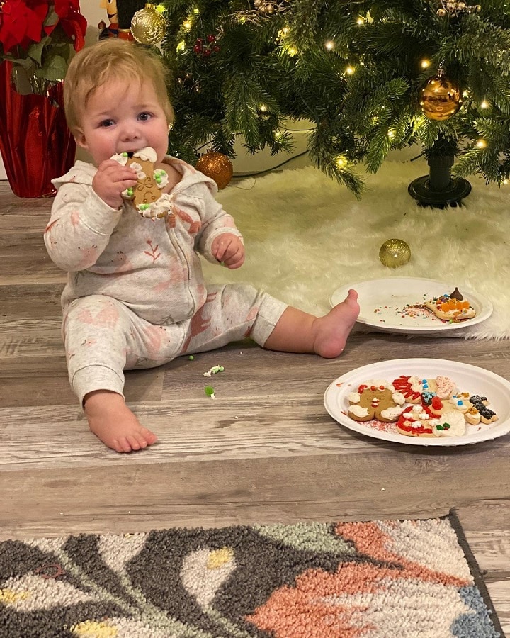 Baby Avalon Eats Christmas Cookie [Credit: Christine Brown/Instagram]